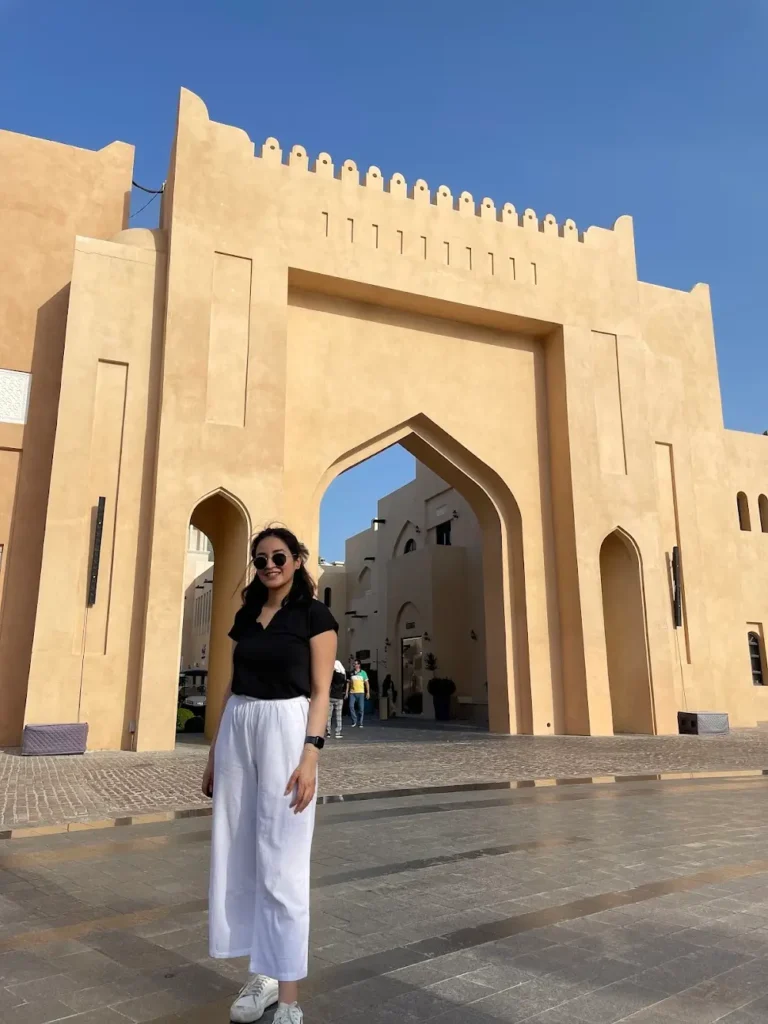 Blogger smiling at Katara Cultural Village in Doha Qatar